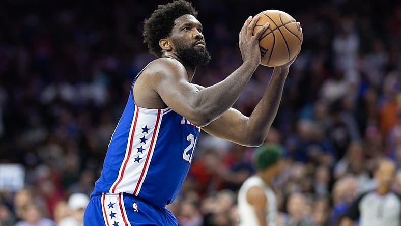 Apr 4, 2023; Philadelphia, Pennsylvania, USA; Philadelphia 76ers center Joel Embiid (21) shoots a technical foul shot against the Boston Celtics during the fourth quarter at Wells Fargo Center. Mandatory Credit: Bill Streicher-USA TODAY Sports