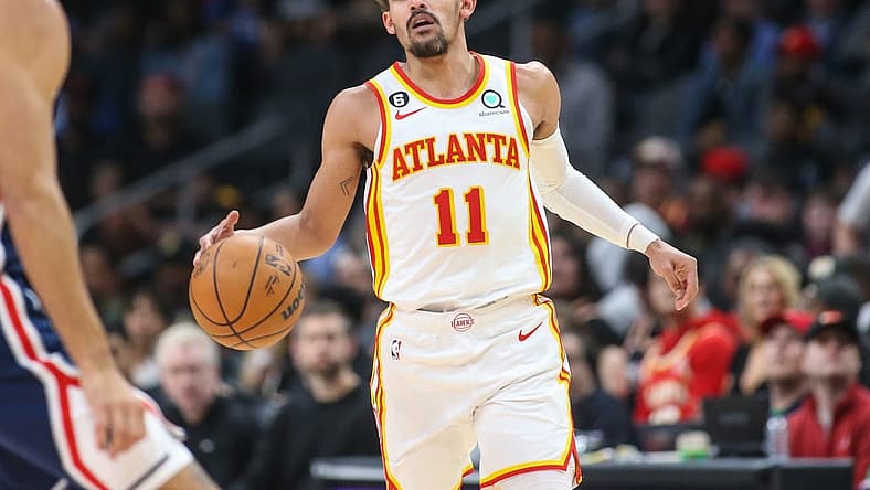 Apr 5, 2023; Atlanta, Georgia, USA; Atlanta Hawks guard Trae Young (11) dribbles against the Washington Wizards in the first half at State Farm Arena. Mandatory Credit: Brett Davis-USA TODAY Sports