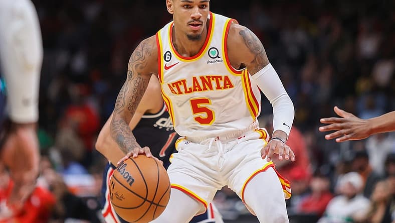 Apr 5, 2023; Atlanta, Georgia, USA; Atlanta Hawks guard Dejounte Murray (5) dribbles against the Washington Wizards in the first half at State Farm Arena. Mandatory Credit: Brett Davis-USA TODAY Sports