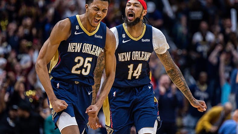 Apr 5, 2023; New Orleans, Louisiana, USA; New Orleans Pelicans guard Trey Murphy III (25) reacts to making a three point basket with forward Brandon Ingram (14) against the Memphis Grizzlies during the second half at Smoothie King Center. Mandatory Credit: Stephen Lew-USA TODAY Sports