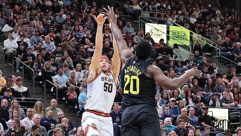 Apr 8, 2023; Salt Lake City, Utah, USA; Denver Nuggets forward Aaron Gordon (50) shoots over Utah Jazz center Udoka Azubuike (20) in the second quarter at Vivint Arena. Mandatory Credit: Rob Gray-USA TODAY Sports