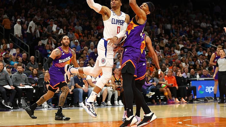 Apr 9, 2023; Phoenix, Arizona, USA; Los Angeles Clippers guard Russell Westbrook (0) drives to the basket against the Phoenix Suns in the first half at Footprint Center. Mandatory Credit: Mark J. Rebilas-USA TODAY Sports