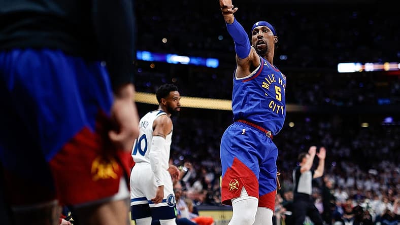 Apr 16, 2023; Denver, Colorado, USA; Denver Nuggets guard Kentavious Caldwell-Pope (5) gestures after a play in the second quarter against the Minnesota Timberwolves during game one of the 2023 NBA Playoffs at Ball Arena. Mandatory Credit: Isaiah J. Downing-USA TODAY Sports