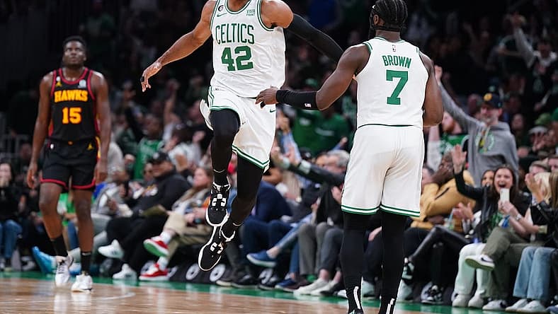 Apr 18, 2023; Boston, Massachusetts, USA; Boston Celtics center Al Horford (42) reacts after his three point basket against the bAtlanta Hawks in the third quarter during game two of the 2023 NBA playoffs at TD Garden. Mandatory Credit: David Butler II-USA TODAY Sports