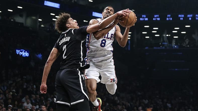 Apr 20, 2023; Brooklyn, New York, USA; Philadelphia 76ers guard De'Anthony Melton (8) looks to drive past Brooklyn Nets forward Cameron Johnson (2) during game three of the 2023 NBA playoffs at Barclays Center. Mandatory Credit: Wendell Cruz-USA TODAY Sports