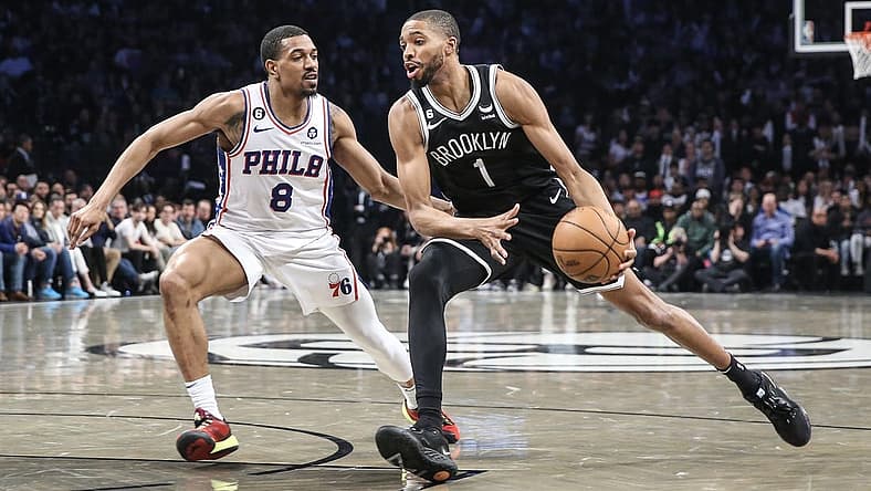 Apr 20, 2023; Brooklyn, New York, USA; Brooklyn Nets forward Mikal Bridges (1) looks to drive past Philadelphia 76ers guard De'Anthony Melton (8) during game three of the 2023 NBA playoffs at Barclays Center. Mandatory Credit: Wendell Cruz-USA TODAY Sports