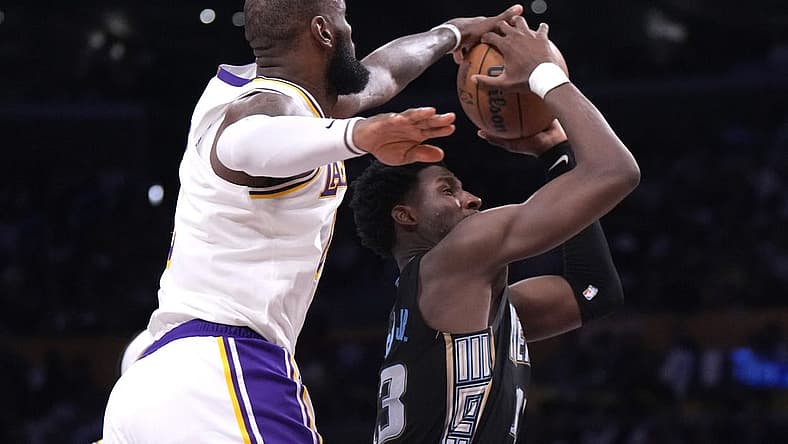 Apr 22, 2023; Los Angeles, California, USA; Los Angeles Lakers forward LeBron James (6) blocks a shot by Memphis Grizzlies forward Jaren Jackson Jr. (13) in the fourth quarter during game three of the 2023 NBA playoffs at Crypto.com Arena. Mandatory Credit: Kirby Lee-USA TODAY Sports