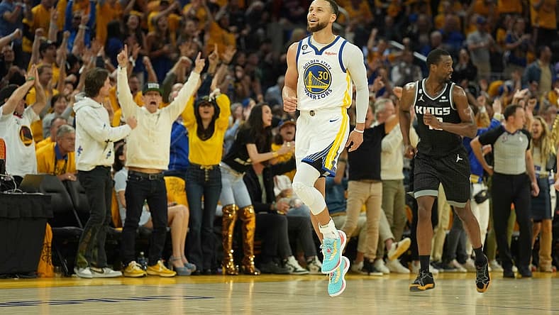 Apr 23, 2023; San Francisco, California, USA; Golden State Warriors guard Stephen Curry (30) reacts after scoring against the Sacramento Kings during the second quarter of game four of the 2023 NBA playoffs at Chase Center. Mandatory Credit: Darren Yamashita-USA TODAY Sports