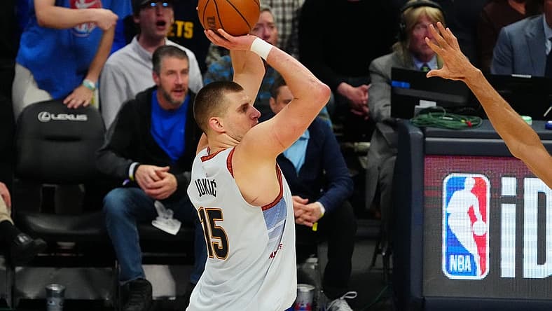 Apr 25, 2023; Denver, Colorado, USA; Denver Nuggets center Nikola Jokic (15) shoots in the second half against the Minnesota Timberwolves in game five of the 2023 NBA Playoffs at Ball Arena. Mandatory Credit: Ron Chenoy-USA TODAY Sports