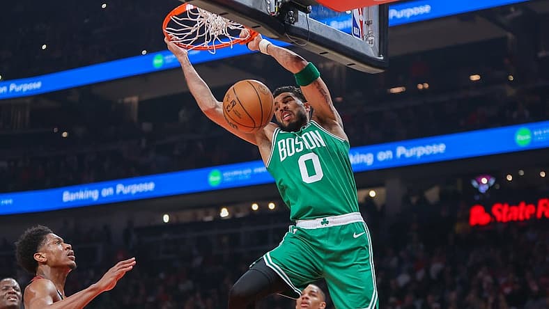 Apr 27, 2023; Atlanta, Georgia, USA; Boston Celtics forward Jayson Tatum (0) dunks the ball against the Atlanta Hawks in the first quarter during game six of the 2023 NBA playoffs at State Farm Arena. Mandatory Credit: Brett Davis-USA TODAY Sports