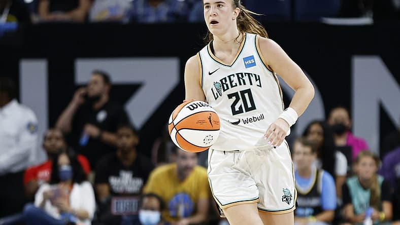 Aug 17, 2022; Chicago, Illinois, USA; New York Liberty guard Sabrina Ionescu (20) brings the ball up court against the Chicago Sky during the second half of game one of the first round of the WNBA playoffs at Wintrust Arena. Mandatory Credit: Kamil Krzaczynski-USA TODAY Sports