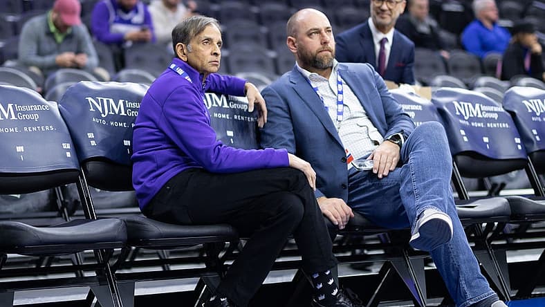 Dec 13, 2022; Philadelphia, Pennsylvania, USA; Sacramento Kings owner Vivek Ranadive (L) and general manager Monte McNair (R) look on during warm ups before a game against the Philadelphia 76ers at Wells Fargo Center. Mandatory Credit: Bill Streicher-USA TODAY Sports