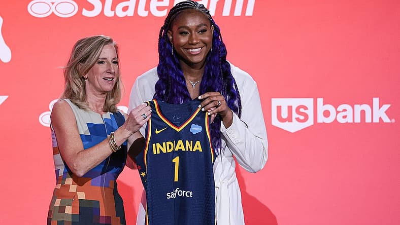 Apr 10, 2023; New York, NY, USA; Aliyah Boston poses for a photo with WNBA Commissioner Cathy Engelbert after being drafted first overall by the Indiana Fever during WNBA Draft 2023 at Spring Studio. Mandatory Credit: Vincent Carchietta-USA TODAY Sports