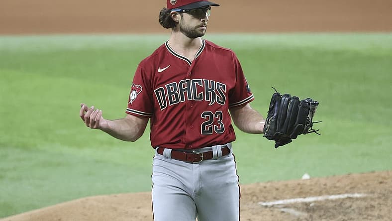 May 2, 2023; Arlington, Texas, USA; Arizona Diamondbacks starting pitcher Zac Gallen (23) reacts during the game against the Texas Rangers at Globe Life Field. Mandatory Credit: Kevin Jairaj-USA TODAY Sports