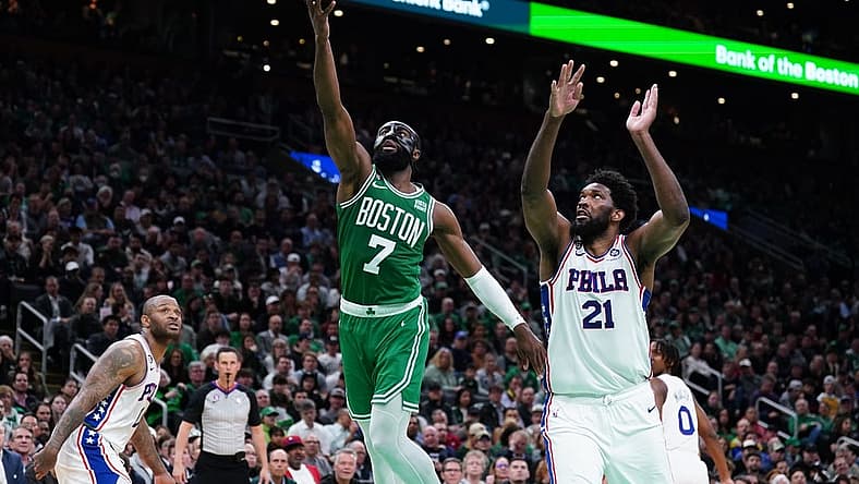 May 3, 2023; Boston, Massachusetts, USA; Boston Celtics guard Jaylen Brown (7) drives to the basket against Philadelphia 76ers center Joel Embiid (21) in the third quarter during game two of the 2023 NBA playoffs at TD Garden. Mandatory Credit: David Butler II-USA TODAY Sports