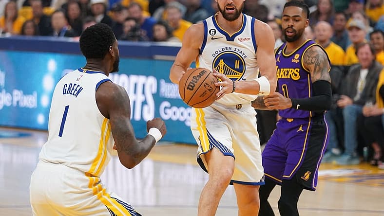 May 4, 2023; San Francisco, California, USA; Golden State Warriors guard Klay Thompson (11) holds onto a rebound against the Los Angeles Lakers in the first quarter during game two of the 2023 NBA playoffs at the Chase Center. Mandatory Credit: Cary Edmondson-USA TODAY Sports
