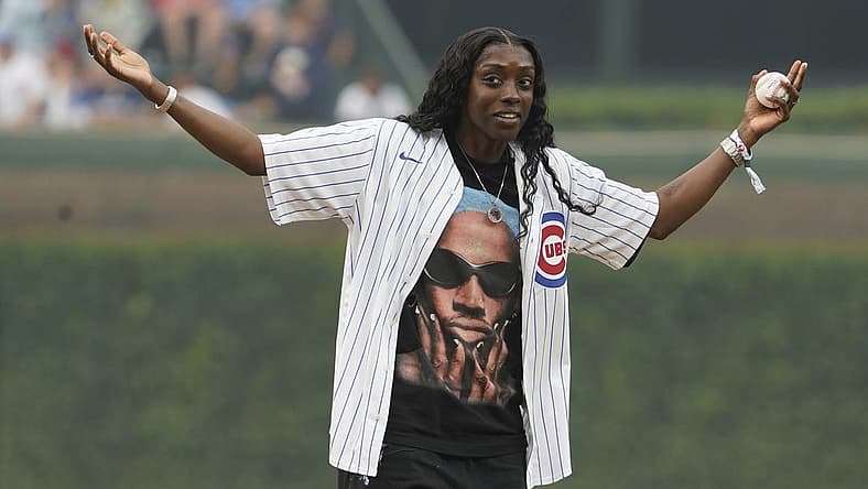 Jun 27, 2023; Chicago, Illinois, USA; Chicago Sky s WNBA player Kahleah Copper throws a ceremonial first pitch before the game between the Chicago Cubs and the Philadelphia Phillies at Wrigley Field. Mandatory Credit: David Banks-USA TODAY Sports