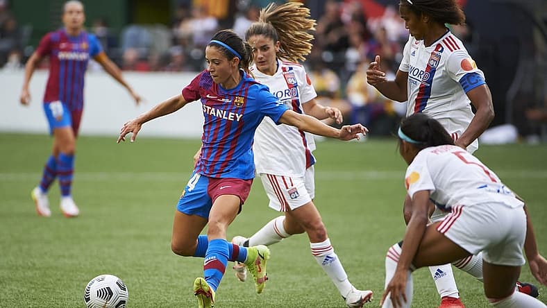 Aug 18, 2021; Portland, OR, USA;  FC Barcelona midfielder Aitana Bonmati (14) passes the ball against Olympique Lyonnais during the second half at Providence Park. Olympique Lyonnais won 3-2. Mandatory Credit: Troy Wayrynen-USA TODAY Sports