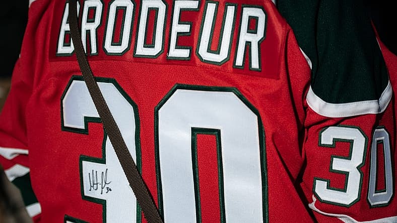 A fan with a signed Martin Brodeur jersey stands outside of the Adirondack Bank Center in Utica on Wednesday, April 6, 2022.

Martin Brodeur And Rob Esche