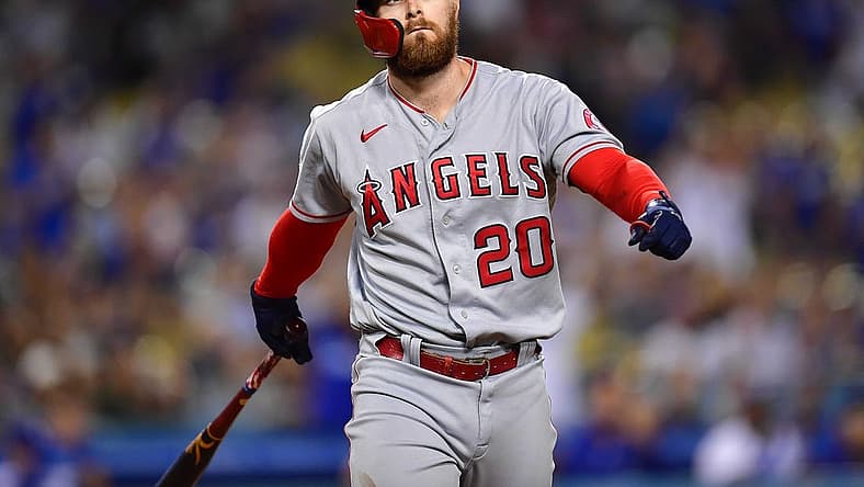 Jun 14, 2022; Los Angeles, California, USA; Los Angeles Angels first baseman Jared Walsh (20) reacts after striking out with bases loaded against the Los Angeles Dodgers during the ninth inning at Dodger Stadium. Mandatory Credit: Gary A. Vasquez-USA TODAY Sports