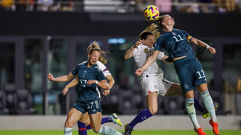 Germany forward Alexandra Popp (11) clears a cross intended for United States midfielder Andi Sullivan (17) during the first half at DRV PNK Stadium. Mandatory Credit: Sam Navarro-USA TODAY Sports