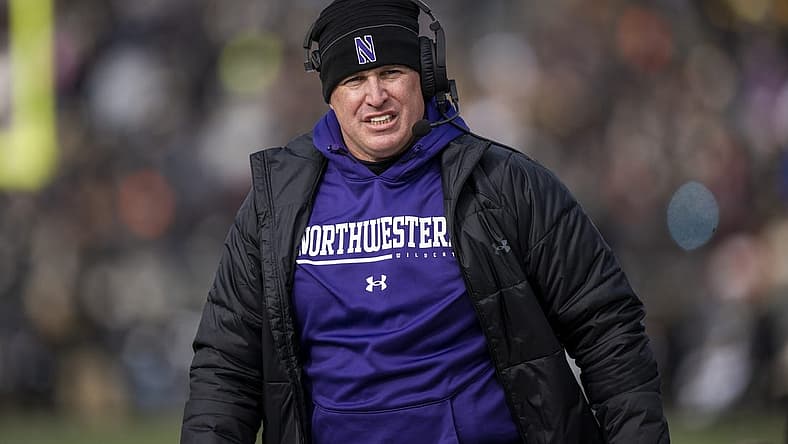 Nov 19, 2022; West Lafayette, Indiana, USA; Northwestern Wildcats head coach Pat Fitzgerald walks the sidelines during the second quarter against the Purdue Boilermakers at Ross-Ade Stadium. Mandatory Credit: Marc Lebryk-USA TODAY Sports