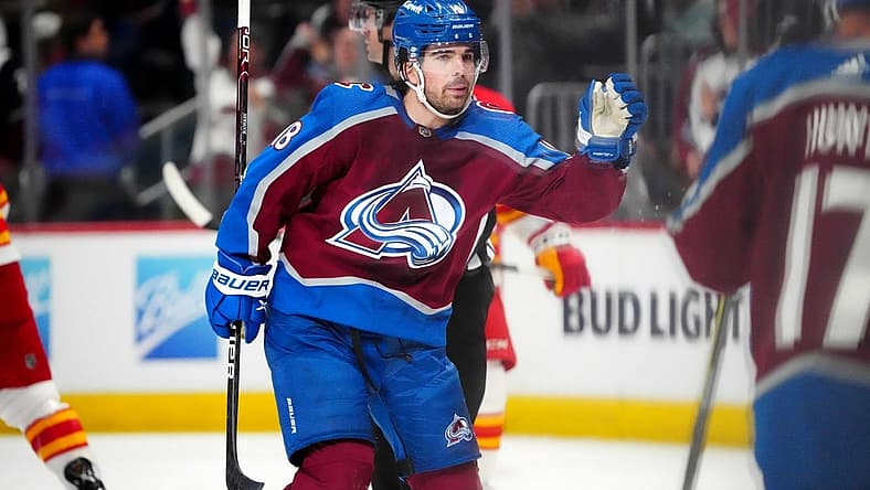 Feb 25, 2023; Denver, Colorado, USA; Colorado Avalanche center Alex Newhook (18) celebrates his goal in the first period against the Colorado Avalanche at Ball Arena. Mandatory Credit: Ron Chenoy-USA TODAY Sports