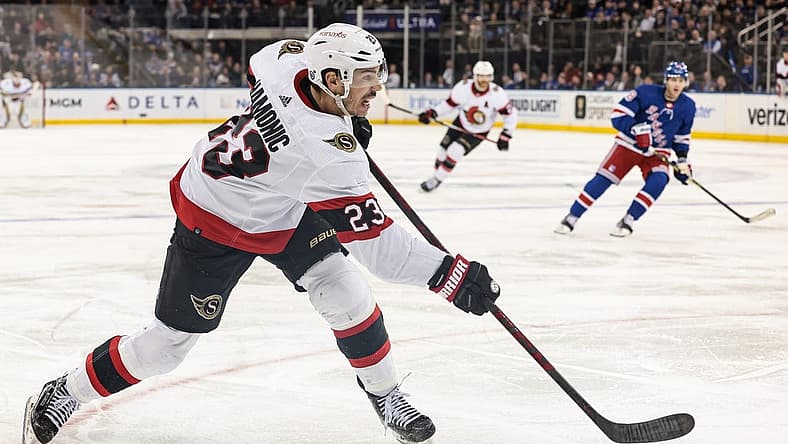 Mar 2, 2023; New York, New York, USA; Ottawa Senators defenseman Travis Hamonic (23) shoots the puck during the third period against the New York Rangers at Madison Square Garden. Mandatory Credit: Vincent Carchietta-USA TODAY Sports