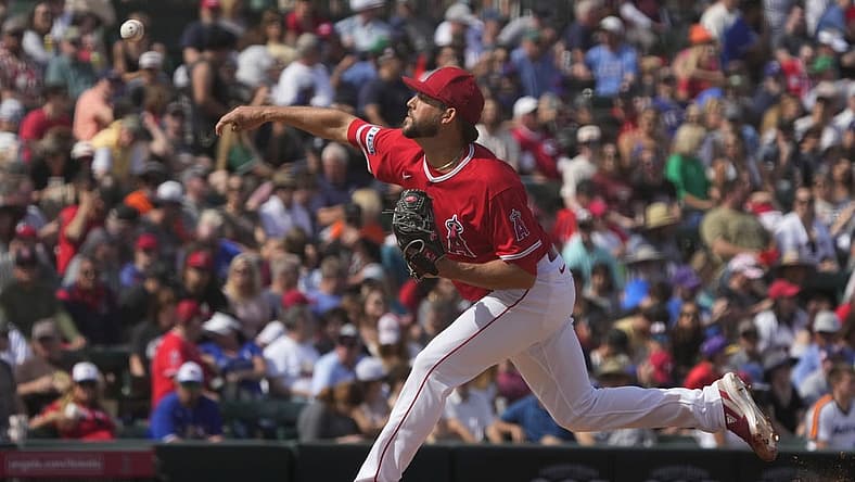 Mar 18, 2023; Tempe, Arizona, USA; Los Angeles Angels relief pitcher Ryan Tepera (52) throws against the Texas Rangers in the fifth inning at Tempe Diablo Stadium. Mandatory Credit: Rick Scuteri-USA TODAY Sports