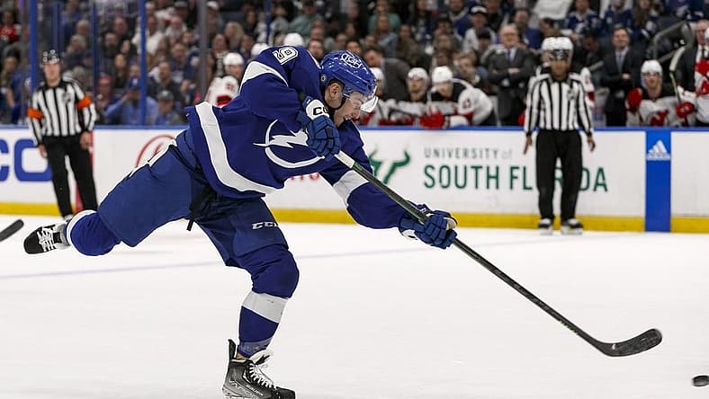Mar 19, 2023; Tampa, Florida, USA; Tampa Bay Lightning center Ross Colton (79) takes a shot against New Jersey Devils during the first period at Amalie Arena. Mandatory Credit: Morgan Tencza-USA TODAY Sports