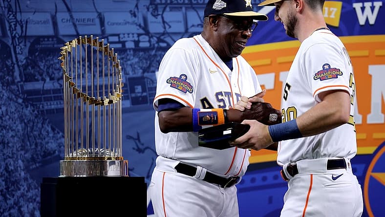 Mar 31, 2023; Houston, Texas, USA; Houston Astros manager Dusty Baker Jr. (12) celebrates with Houston Astros right fielder Kyle Tucker (30) after receiving their 2022 World Series championship rings prior to the game against the Chicago White Sox at Minute Maid Park. Mandatory Credit: Erik Williams-USA TODAY Sports