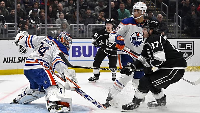 Apr 4, 2023; Los Angeles, California, USA; Edmonton Oilers goaltender Stuart Skinner (74) makes a save off a shot by Los Angeles Kings center Zack MacEwen (17) in the second period at Crypto.com Arena. Mandatory Credit: Jayne Kamin-Oncea-USA TODAY Sports
