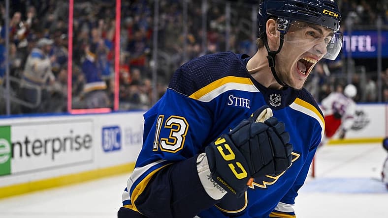 Apr 6, 2023; St. Louis, Missouri, USA;  St. Louis Blues right wing Alexey Toropchenko (13) reacts after scoring against the New York Rangers during the second period at Enterprise Center. Mandatory Credit: Jeff Curry-USA TODAY Sports
