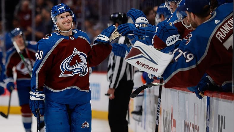 Apr 11, 2023; Denver, Colorado, USA; Colorado Avalanche center Ben Meyers (59) celebrates with the bench after a goal in the first period against the Edmonton Oilers at Ball Arena. Mandatory Credit: Isaiah J. Downing-USA TODAY Sports