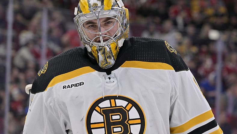 Apr 13, 2023; Montreal, Quebec, CAN; Boston Bruins goalie Jeremy Swayman (1) takes a breather during the second period of the game against the Montreal Canadiens at the Bell Centre. Mandatory Credit: Eric Bolte-USA TODAY Sports