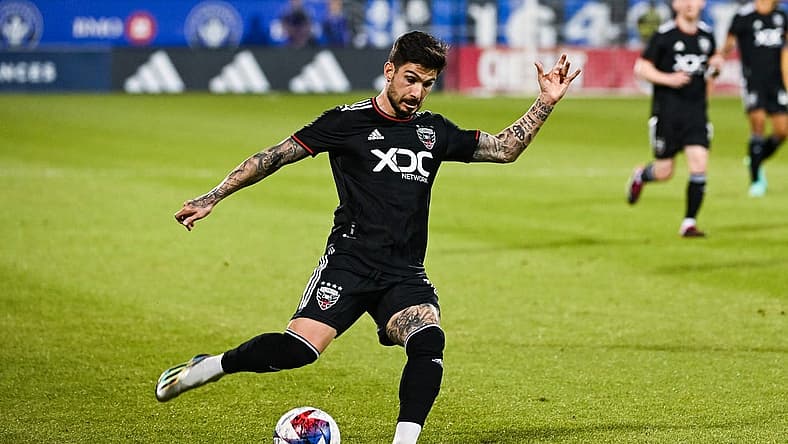 Apr 15, 2023; Montreal, Quebec, CAN;DC United forward Taxi Fountas (11) kicks the ball during the first half against D.C. United at Stade Saputo. Mandatory Credit: David Kirouac-USA TODAY Sports