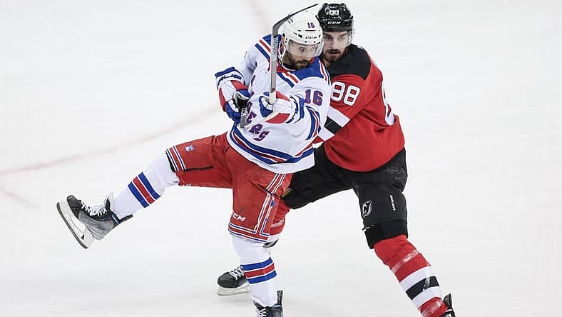 Apr 20, 2023; Newark, New Jersey, USA; New York Rangers center Vincent Trocheck (16) and New Jersey Devils defenseman Kevin Bahl (88) during the first period in game two of the first round of the 2023 Stanley Cup Playoffs at Prudential Center. Mandatory Credit: Vincent Carchietta-USA TODAY Sports