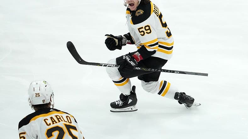 Apr 23, 2023; Sunrise, Florida, USA; Boston Bruins left wing Tyler Bertuzzi (59) celebrates his goal against the Florida Panthers during the third period of game four in the first round of the 2023 Stanley Cup Playoffs at FLA Live Arena. Mandatory Credit: Jasen Vinlove-USA TODAY Sports