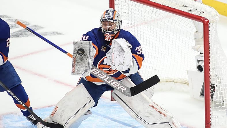 Apr 28, 2023; Elmont, New York, USA; New York Islanders goaltender Ilya Sorokin (30) stops the puck in game six of the first round of the 2023 Stanley Cup Playoffs against the Carolina Hurricanes at UBS Arena. Mandatory Credit: Wendell Cruz-USA TODAY Sports