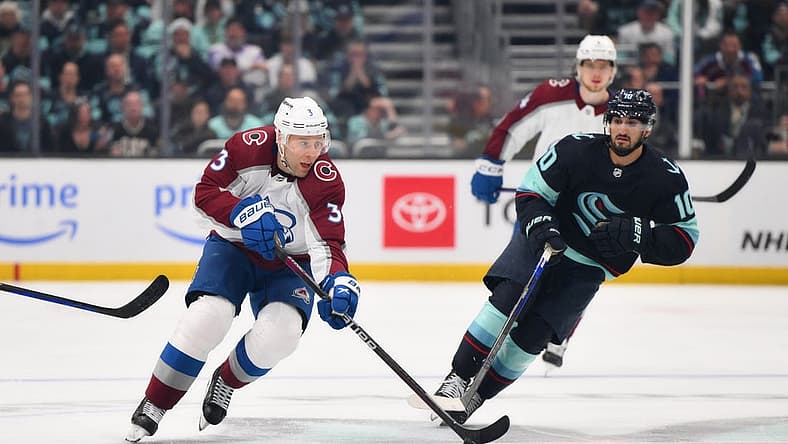 Apr 28, 2023; Seattle, Washington, USA; Colorado Avalanche defenseman Jack Johnson (3) advances the puck against the Seattle Kraken during the third period in game six of the first round of the 2023 Stanely Cup Playoffs at Climate Pledge Arena. Mandatory Credit: Steven Bisig-USA TODAY Sports