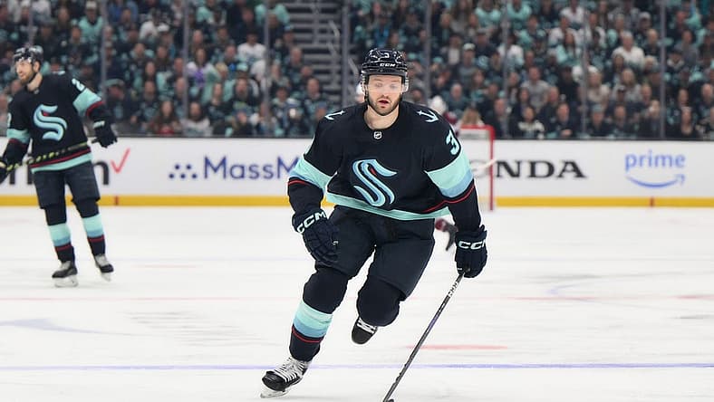 Apr 28, 2023; Seattle, Washington, USA; Seattle Kraken defenseman Will Borgen (3) advances the puck in game six of the first round of the 2023 Stanely Cup Playoffs at Climate Pledge Arena. Mandatory Credit: Steven Bisig-USA TODAY Sports