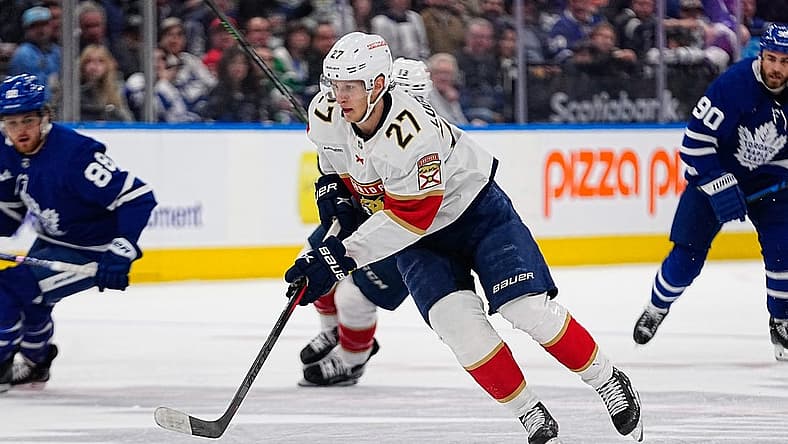 May 4, 2023; Toronto, Ontario, CANADA; Florida Panthers forward Eetu Luostarinen (27) carries the puck against the Toronto Maple Leafs during game two of the second round of the 2023 Stanley Cup Playoffs at Scotiabank Arena. Mandatory Credit: John E. Sokolowski-USA TODAY Sports