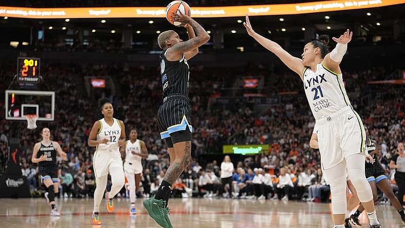 May 13, 2023; Toronto, Ontario, Canada; Minnesota Lynx guard Kayla McBride (21) goes to block a shot by Chicago Sky guard Courtney Williams (10) during the first half at Scotiabank Arena. Mandatory Credit: John E. Sokolowski-USA TODAY Sports