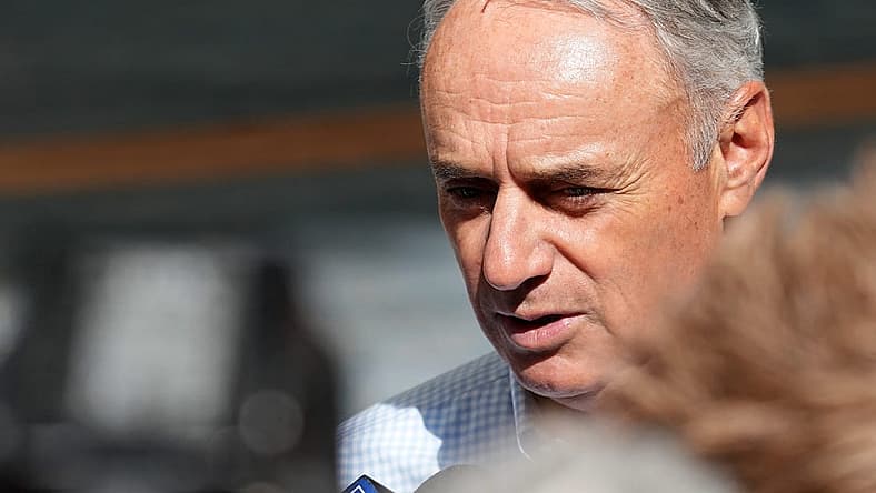 Major League Baseball commissioner Rob Manfred speaks to reporters before the Milwaukee Brewers game against the San Francisco Giants Thursday, May 25, 2023 at American Family Field in Milwaukee, Wis.