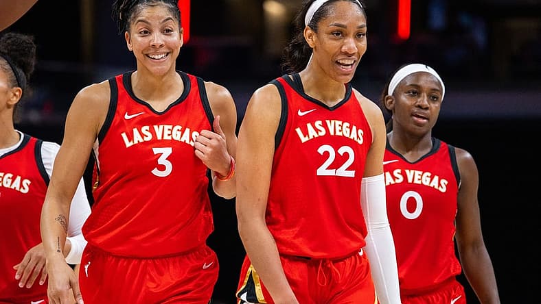 Jun 4, 2023; Indianapolis, Indiana, USA; Las Vegas Aces forward Candace Parker (3) and forward A'ja Wilson (22) celebrates the win against the Indiana Fever at Gainbridge Fieldhouse. Mandatory Credit: Trevor Ruszkowski-USA TODAY Sports