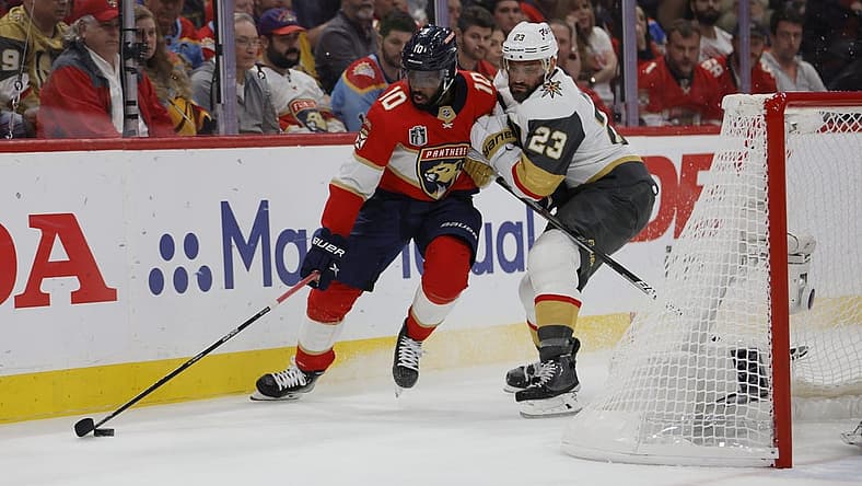 June 10, 2023; Sunrise, FL, USA; Florida Panthers left wing Anthony Duclair (10) battles for the puck against Vegas Golden Knights defenseman Alec Martinez (23) in the second period in game four of the 2023 Stanley Cup Final at FLA Live Arena. Mandatory Credit: Sam Navarro-USA TODAY Sports