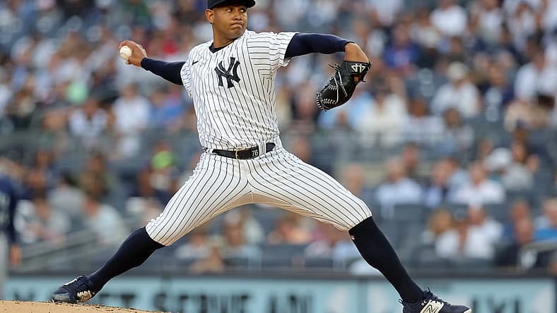 Jun 21, 2023; Bronx, New York, USA; New York Yankees starting pitcher Jhony Brito (76) pitches against Seattle Mariners during the second inning at Yankee Stadium. Mandatory Credit: Brad Penner-USA TODAY Sports
