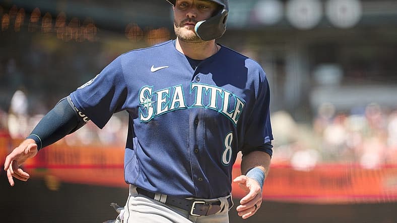 Jul 4, 2023; San Francisco, California, USA; Seattle Mariners designated hitter AJ Pollock (8) scores a run against the San Francisco Giants during the sixth inning at Oracle Park. Mandatory Credit: Robert Edwards-USA TODAY Sports