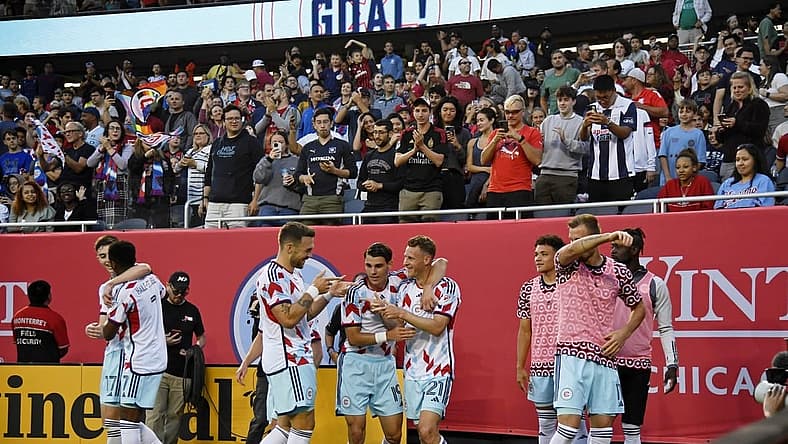 Jul 8, 2023; Chicago, Illinois, USA; Chicago Fire midfielder Fabian Herbers (21) celebrates with teammates after scoring a goal against the Nashville SC during the first half at Soldier Field. Mandatory Credit: Jon Durr-USA TODAY Sports