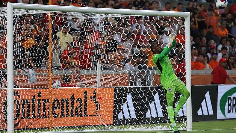 Jul 8, 2023; Houston, Texas, USA; Sporting Kansas City goalkeeper Kendall McIntosh (22) makes a save during the first half against the Houston Dynamo at Shell Energy Stadium. Mandatory Credit: Thomas Shea-USA TODAY Sports